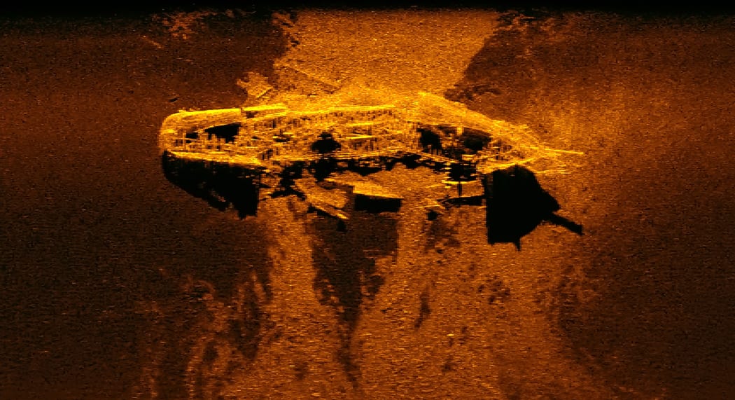 This sonar image was released by the Australian Transport Safety Bureau and shows a ship wreckage on the ocean bed.