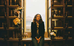 Promotional image of alt country singer Kassi Valazza.