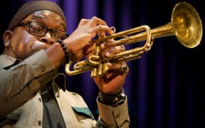 Marquis Hill playing the trumpet