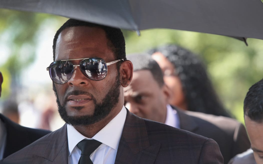 R&B singer R. Kelly pictured outside court in Chicago in June 2019 (file image).