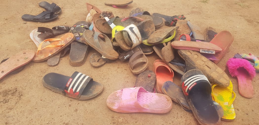Shoes of abducted boarding school students lie on the floor after 140 boarding students of Bethel Baptist School were kidnapped by gunmen in Kaduna, northwestern Nigeria, on July 5, 2021.