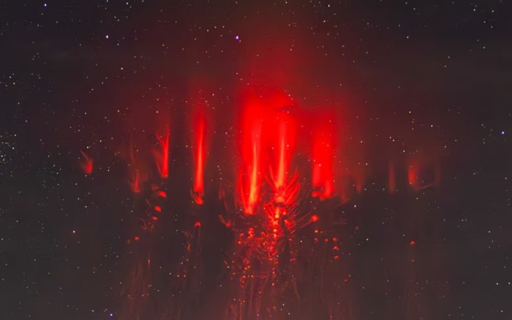 Red sprites are mass electrical discharges that flash high above the intense, active thunderstorms.