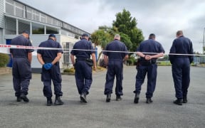 Police at Wycola Park in Hei Hei, Christchurch, where a man was fatally stabbed, 22 December 2023.