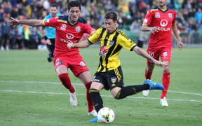 Wellington Phoenix striker Nathan Burns has been named A-League player of the year by Australia's football media.