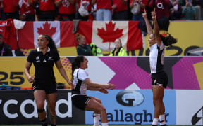 Asia Hogan-Rochester of Canada celebrates.
