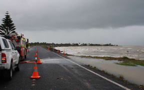 Water is pumped from a property in Kaiaua