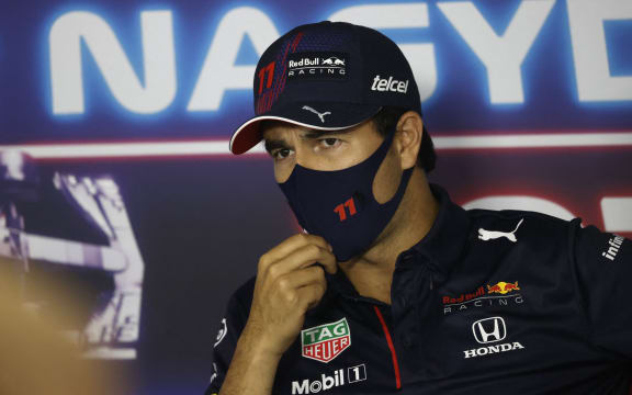 Red Bull's Mexican driver Sergio Perez addresses a press conference at the Hungaroring race track in Mogyorod near Budapest on July 29, 2021, ahead of the Formula One Hungarian Grand Prix.