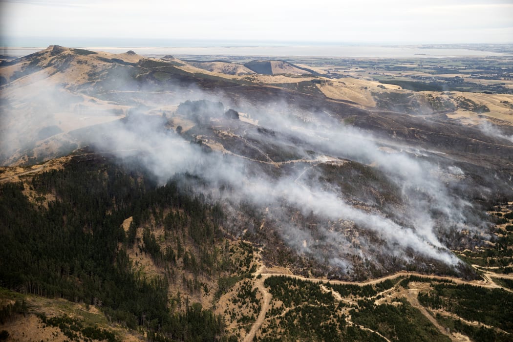 Firefighters a battling a 630 hectare fire in the Port Hills near Christchurch after it broke out on 14 February 2024. The fire remains uncontained and evacuations have taken place for nearby residents.