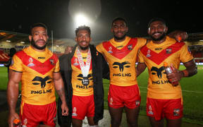 DONCASTER, ENGLAND - OCTOBER 31: Players of Papua New Guinea pose for a photo following the Rugby League World Cup 2021 Pool D match between Papua New Guinea and Wales at the Keepmoat Stadium on October 31, 2022 in Doncaster, England. (Photo by Alex Livesey/Getty Images for RLWC)