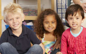 three school children