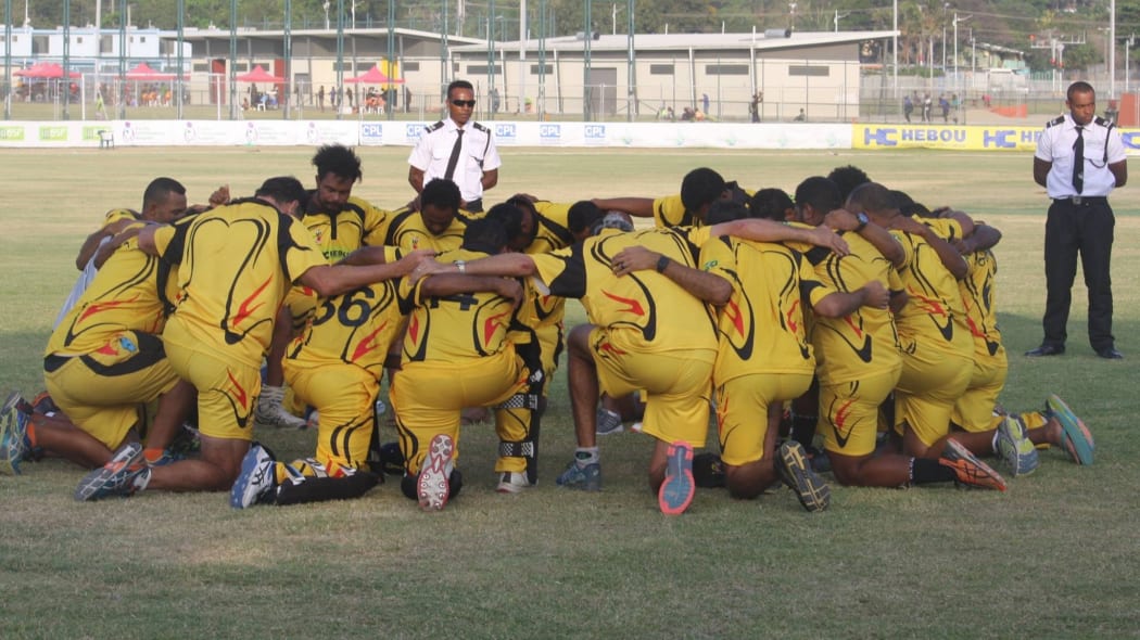 The Barramundis players huddle together during their home series against Scotland.