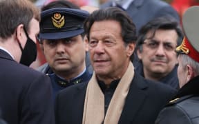 8124911 24.02.2022 Prime Minister of Pakistan Imran Khan takes part in a wreath-laying ceremony at the Tomb of the Unknown Soldier by the Kremlin Wall, in Moscow, Russia.