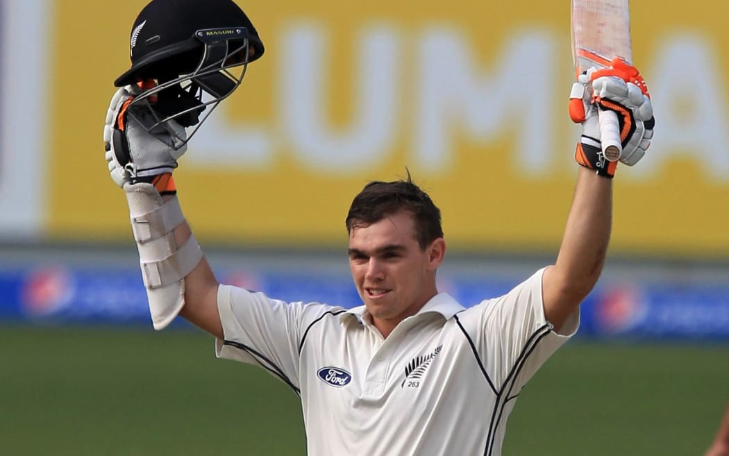 New Zealand cricketer Tom Latham celebrates his century in second test against Pakistan in Dubai 2014.
