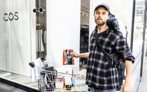 For a dollar and some change, Patchy makes paper cup orders out of a supermarket trolley using instant coffee, boiled water stored in a Thermos, white sugar, and blue cap milk.
RICKY WILSON / STUFF