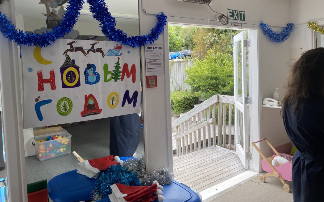 Picture of a wall poster with Russian language printed on it.