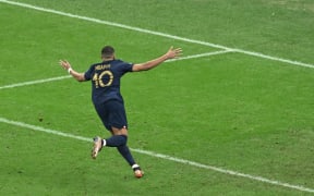 Kylian MBAPPE of France reacts after scoring by PK (penalty kick) in the second half of additional time during FIFA World Cup final match Argentina vs France at Lusail Stadium in Al Daayen, Qatar on December 18, 2022.