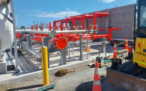 The firefighting foam tank and piping that feeds the firewater monitors (water cannons) on Port Taranaki's Newton King Tanker Terminal.