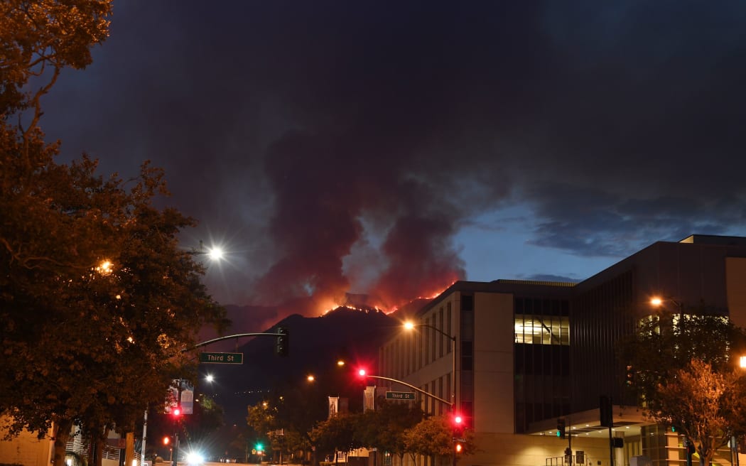 The La Tuna fire burns above downtown Burbank.