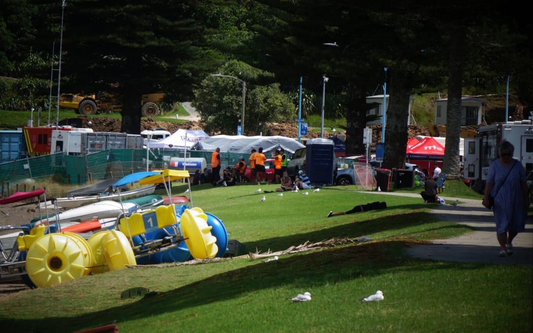 People watch on as work is halted at Mt Maunganui for a second time due to slip fears. Photo taken 29 January 2026.