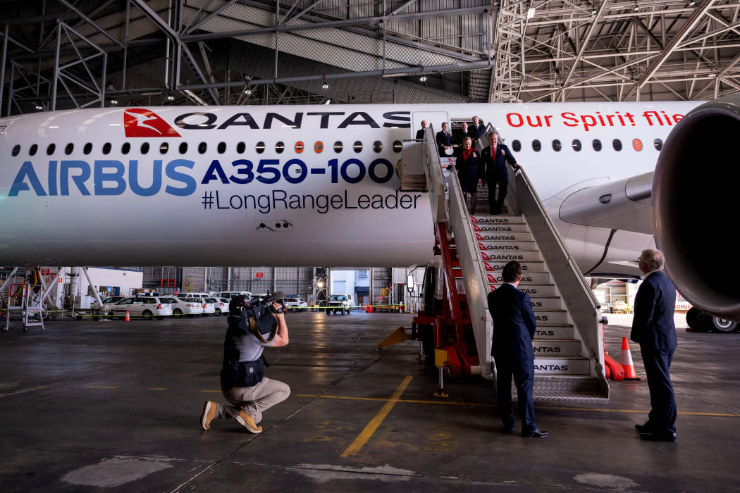 An Airbus A350-1000 aircraft is seen inside a hangar at Sydney international airport on May 2, 2022 to mark a major fleet announcement.