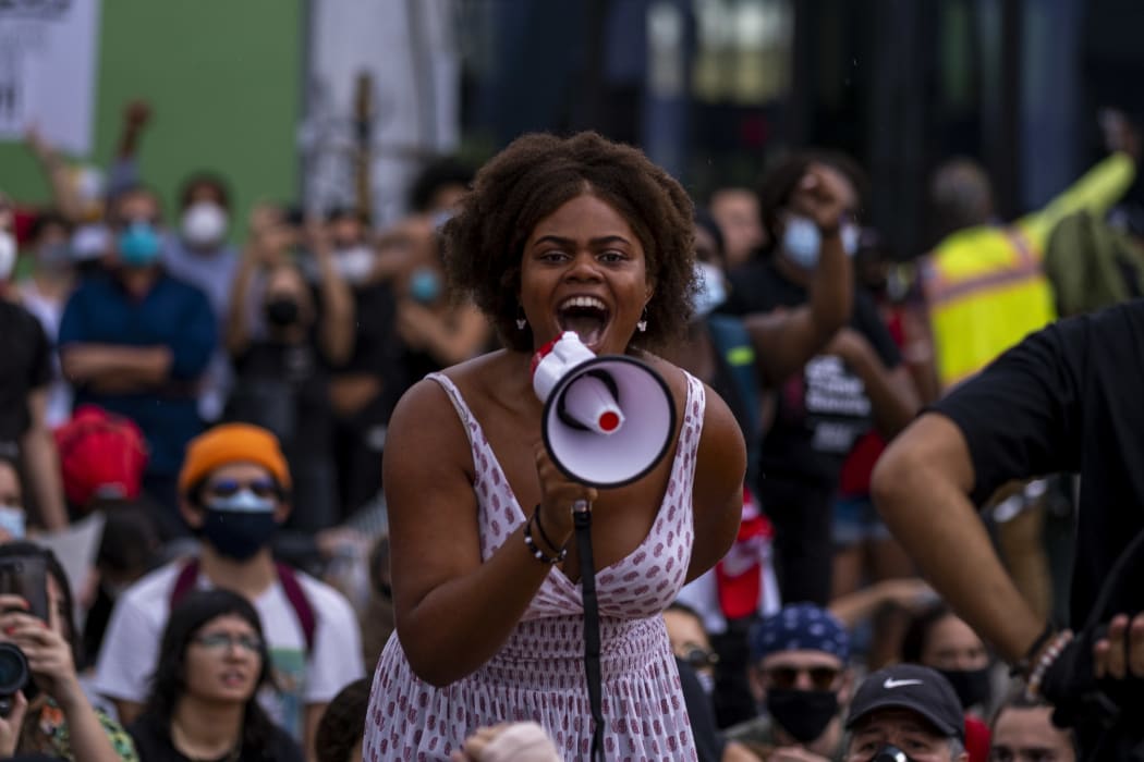 Protesters chant slogans during a rally in Miami, Florida