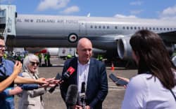 Christopher Luxon speaks to media in Cairns, Australia on his way to an Asia tour.