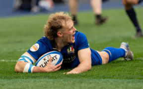 Louis Lynagh scores Italy's first try in their win over Scotland in Six Nations rugby at Stadio Olimpico on February 7, 2026 in Rome.  (Photo by Giuseppe Maffia / NurPhoto via AFP)