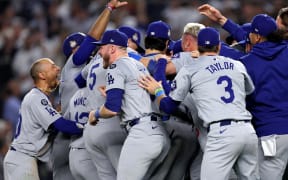 The Los Angeles Dodgers celebrate winning baseball's World Series at Yankee Stadium.