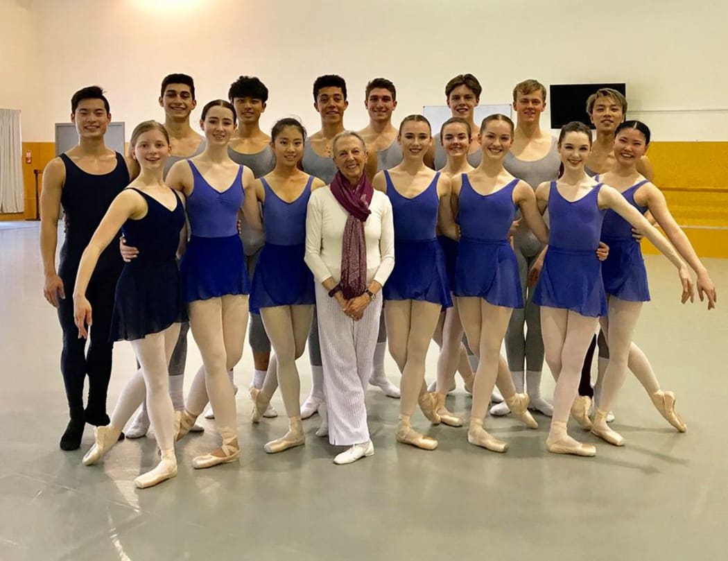 Victoria Simon (centre) with NZSD students