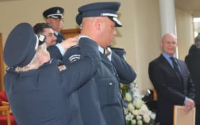 Quentin Manuel gets his epaulette to become a Corrections officer.
