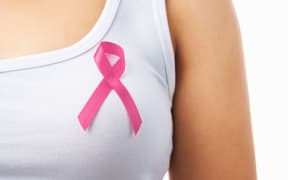 A pink ribbon symbolising breast cancer