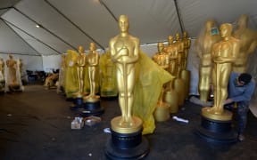 LOS ANGELES, CA - FEBRUARY 23: Sam Costa puts on the finishing touches on Oscar statuette in preparation for the 89th Academy Awards at Hollywood and Highland Center on February 23, 2017 in Los Angeles, California.
