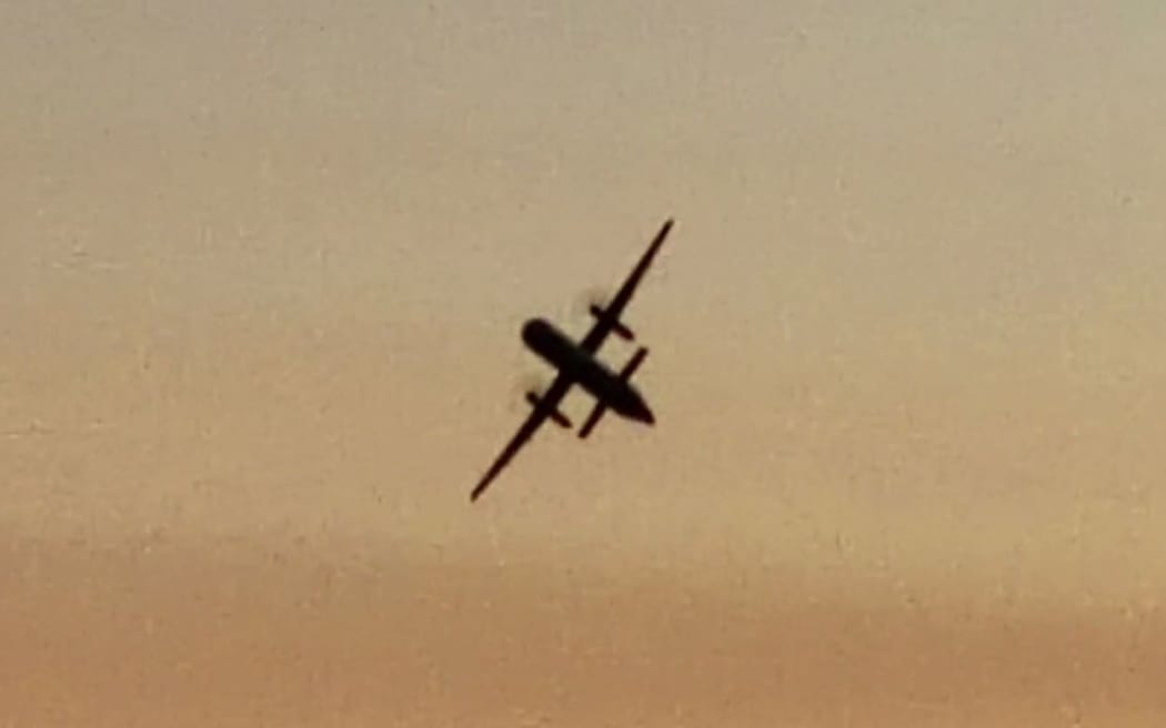 This frame grab taken from footage filmed by bystander John Wauldron of the hijacked plane.