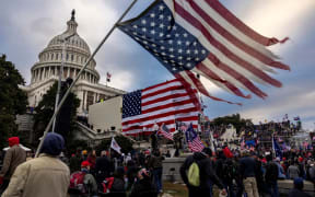 WASHINGTON, DC - JANUARY 6: Pro-Trump protesters gather in front of the U.S. Capitol Building on January 6, 2021 in Washington, DC.