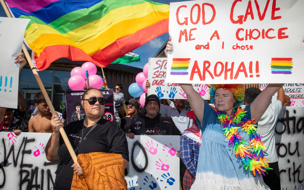 Destiny Church protesters and counter protesters from the rainbow community outside the Gisborne library on 26 March 2024.