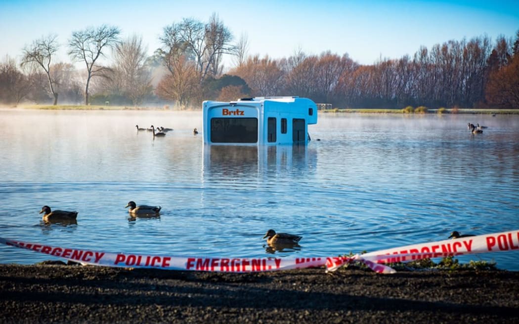 A campervan with five passengers wound up in Henley Lake, Masterton.