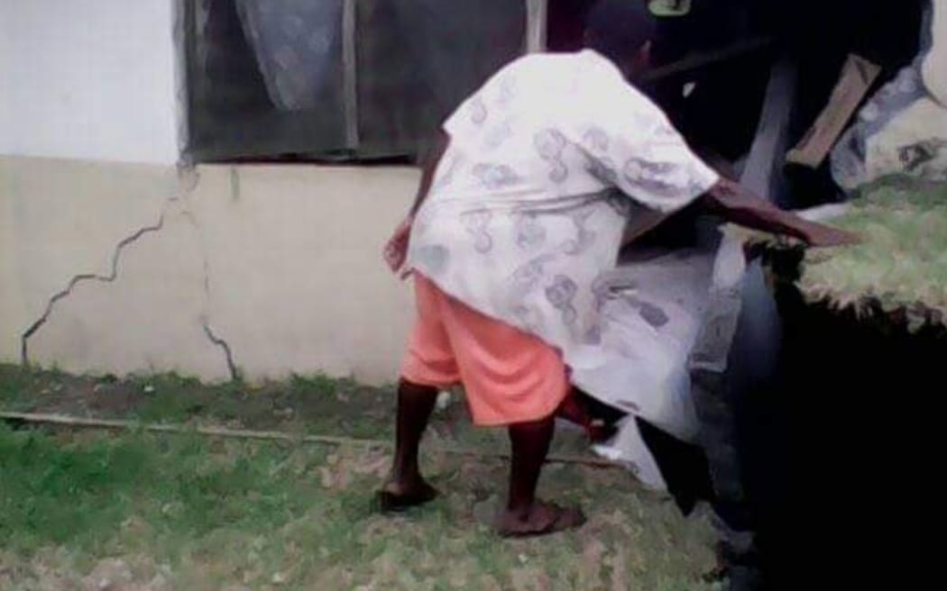A man outside a house on Ambrym
