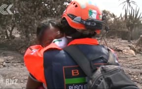 Guatemalan woman's family buried under volcanic ash