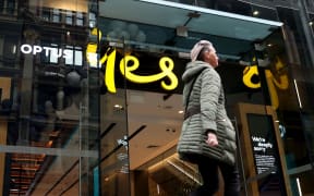 SYDNEY, AUSTRALIA - OCTOBER 05: People walk past an Optus store on October 05, 2022 in Sydney, Australia. The identification details of 9.8 million customers of the Telecommunications operator Optus was stolen in a data breach last week, one of the largest data breaches to occur in Australia. (Photo by Brendon Thorne/Getty Images)