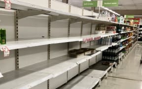 Shelves where disinfectant wipes ,toilet tissues, bottled water, flu medicines are usually displayed are nearly empty at a  local store on March 03, 2020 in Rhodes area ,Sydney, Australia.