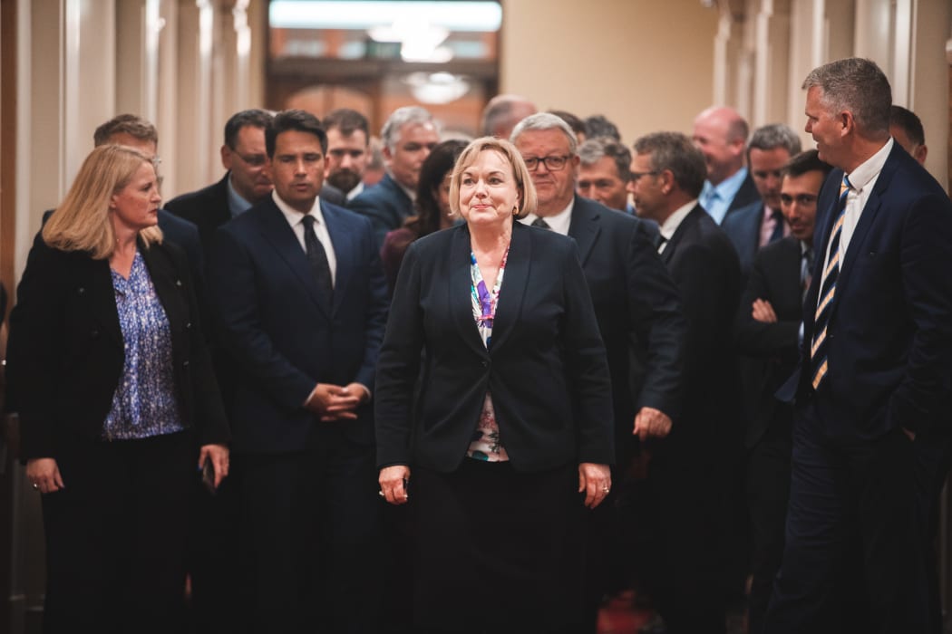 Judith Collins leads the National caucus to Tuesday's media conference.