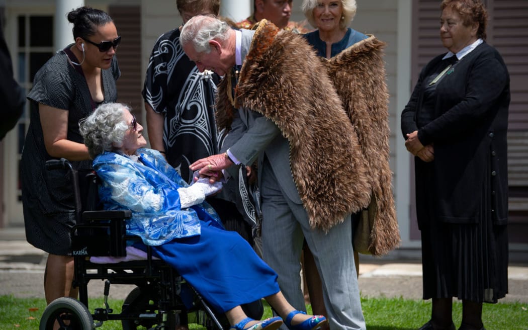 Titewhai Harawira speaking with King Charles at the Waitangi Treaty Grounds during his visit to New Zealand in 2019.