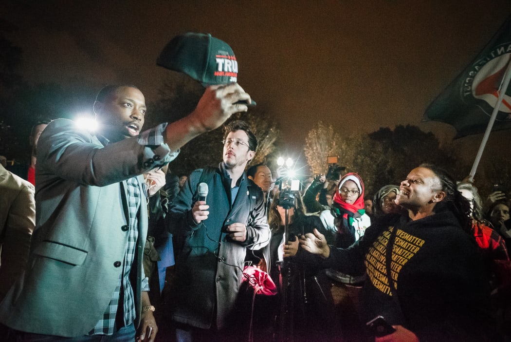 Outside the White House, at 3am, the euphoria of some blends with the anger of others.