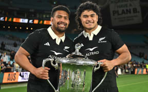Ardie Savea and Wallace Sititi of the All Blacks with the Bledisloe Cup.