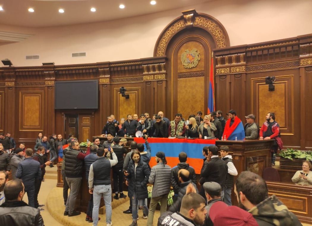Demonstrators storm into Armenia's Parliament building in Yerevan, in against the end of war in Nagorno-Karabakh on 10 November 2020.