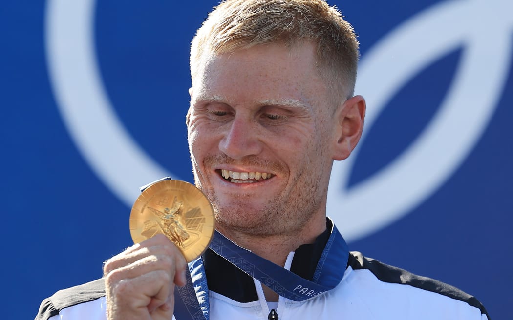 Finn Butcher of New Zealand wins gold in the Kayak Cross, Paris 2024 Olympics.