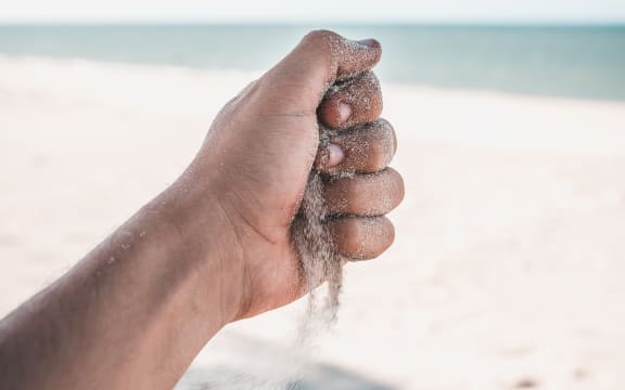 hand with sand