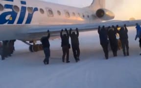 A screenshot from the YouTube video, which showed the stuck plane in Igarka.