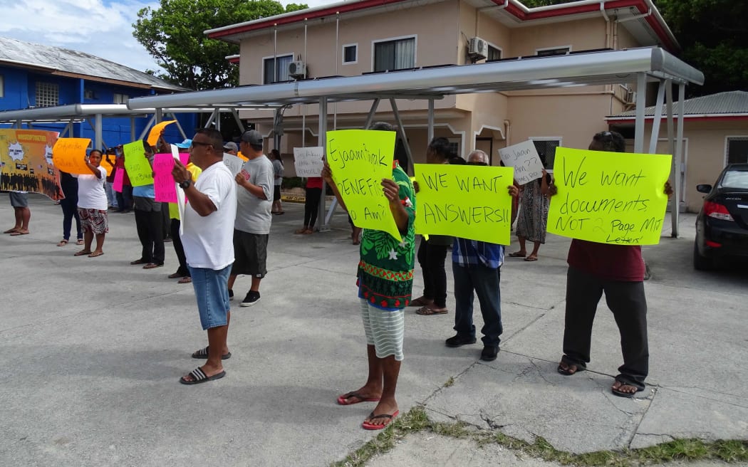In this 2023 file photo, Bikini Islanders demonstrate outside the Majuro Local Government Town Hall, calling for an investigation into leaders' spending practices that have depleted a trust fund that has provided aid to displaced people for more than 40 years. New leaders elected in November 2023 filed a lawsuit this week against their trustees in the United States. Photo: Hilary Hosia.