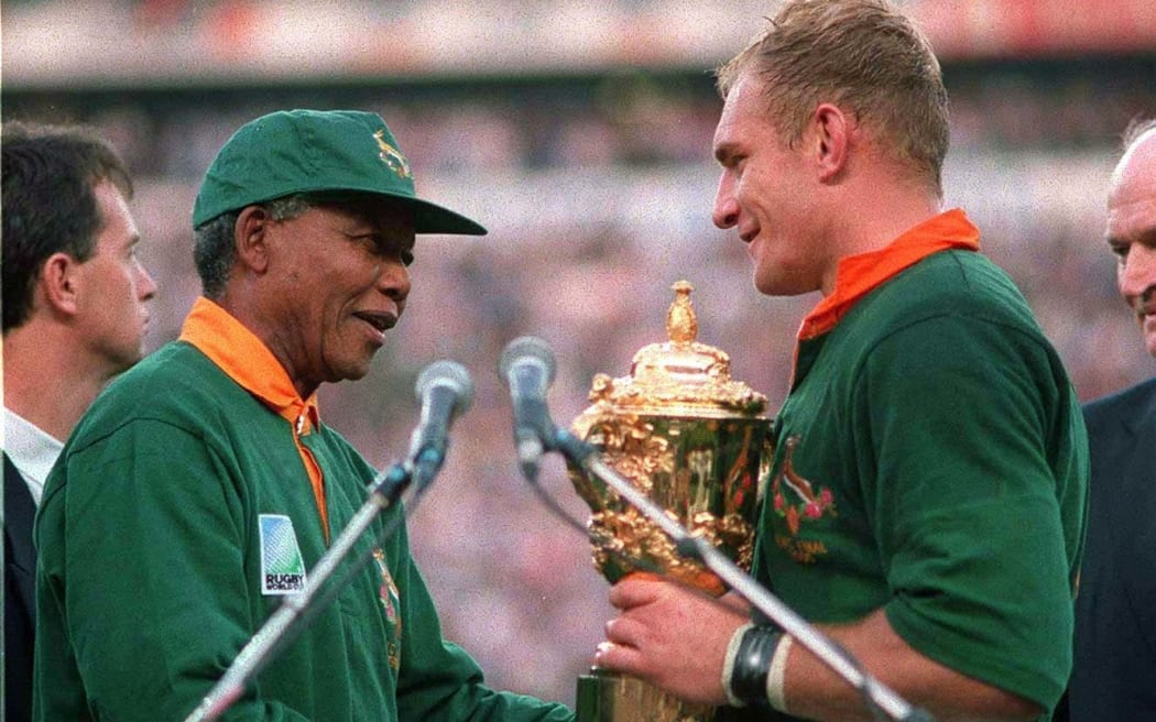Nelson Mandela and Francois Pienaar. Rugby World Cup Final, Ellis Park, 1995.